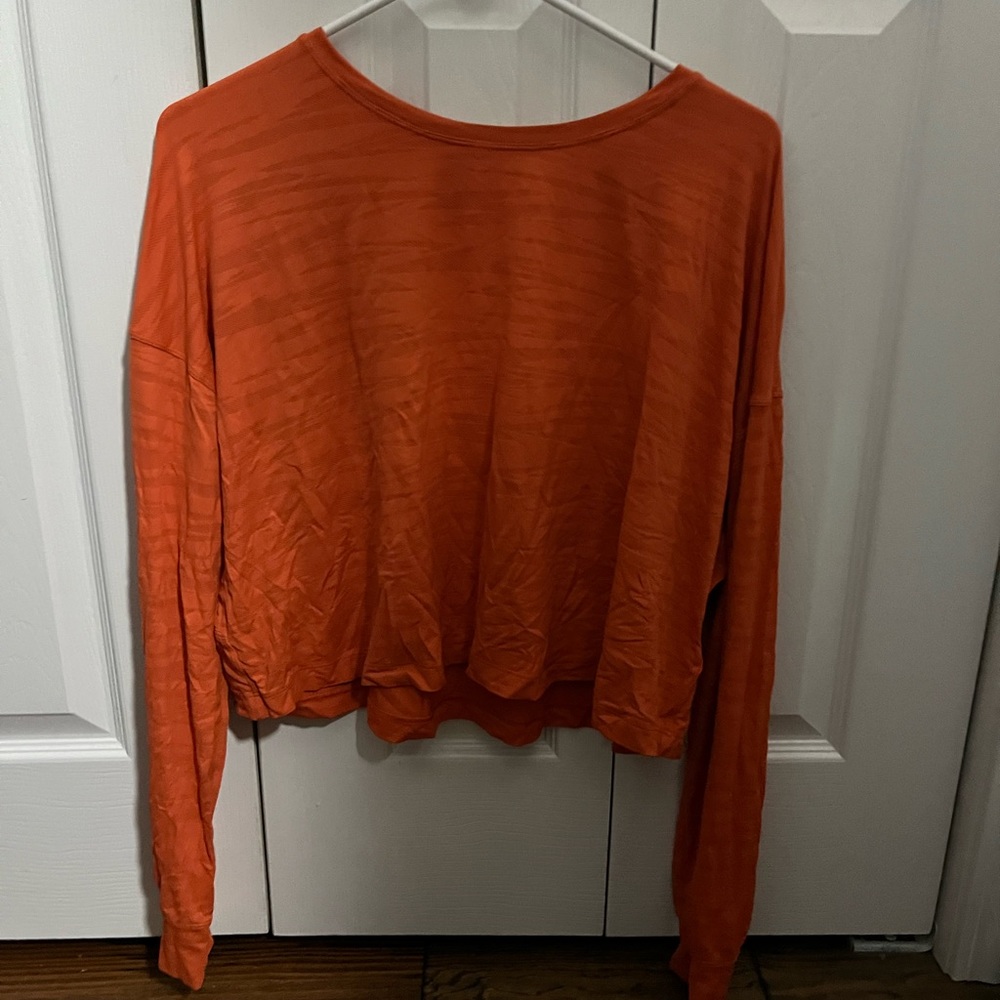 Size 12 orange lululemon cropped shirt- style: tiger mesh